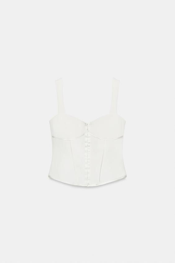 Top bustier à passepoils satinés