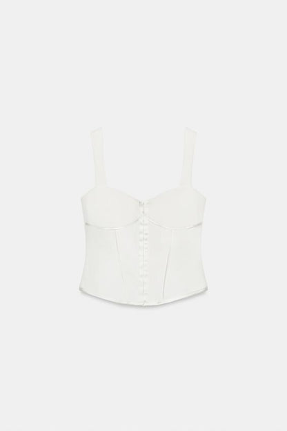 Top bustier à passepoils satinés