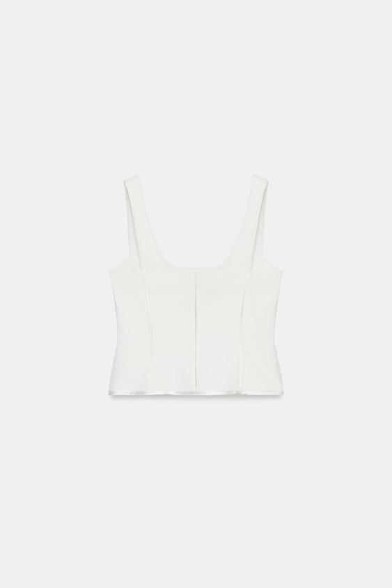 Top bustier à passepoils satinés