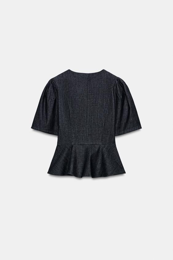 Top peplum à brandebourgs