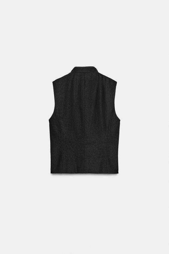 Gilet cintré à brandebourgs