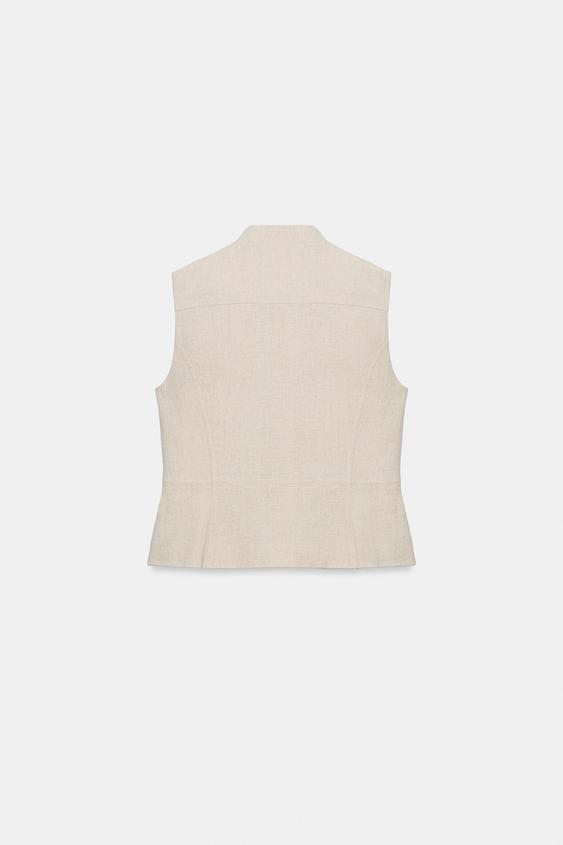 Gilet cintré à brandebourgs