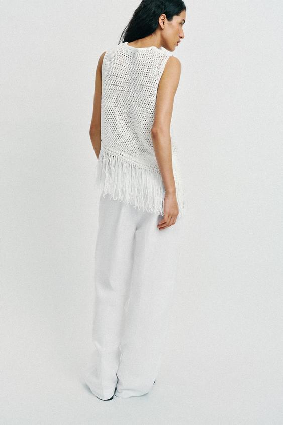 Top en maille à franges