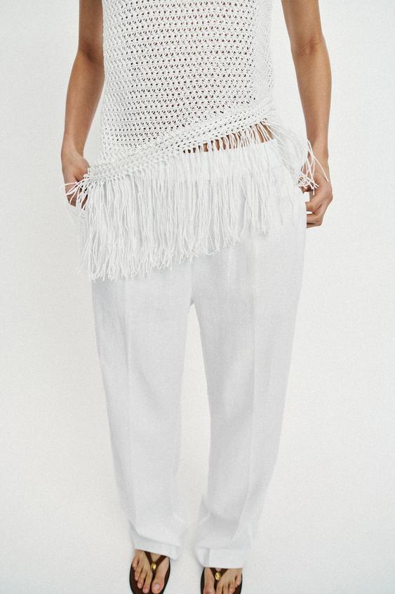 Top en maille à franges