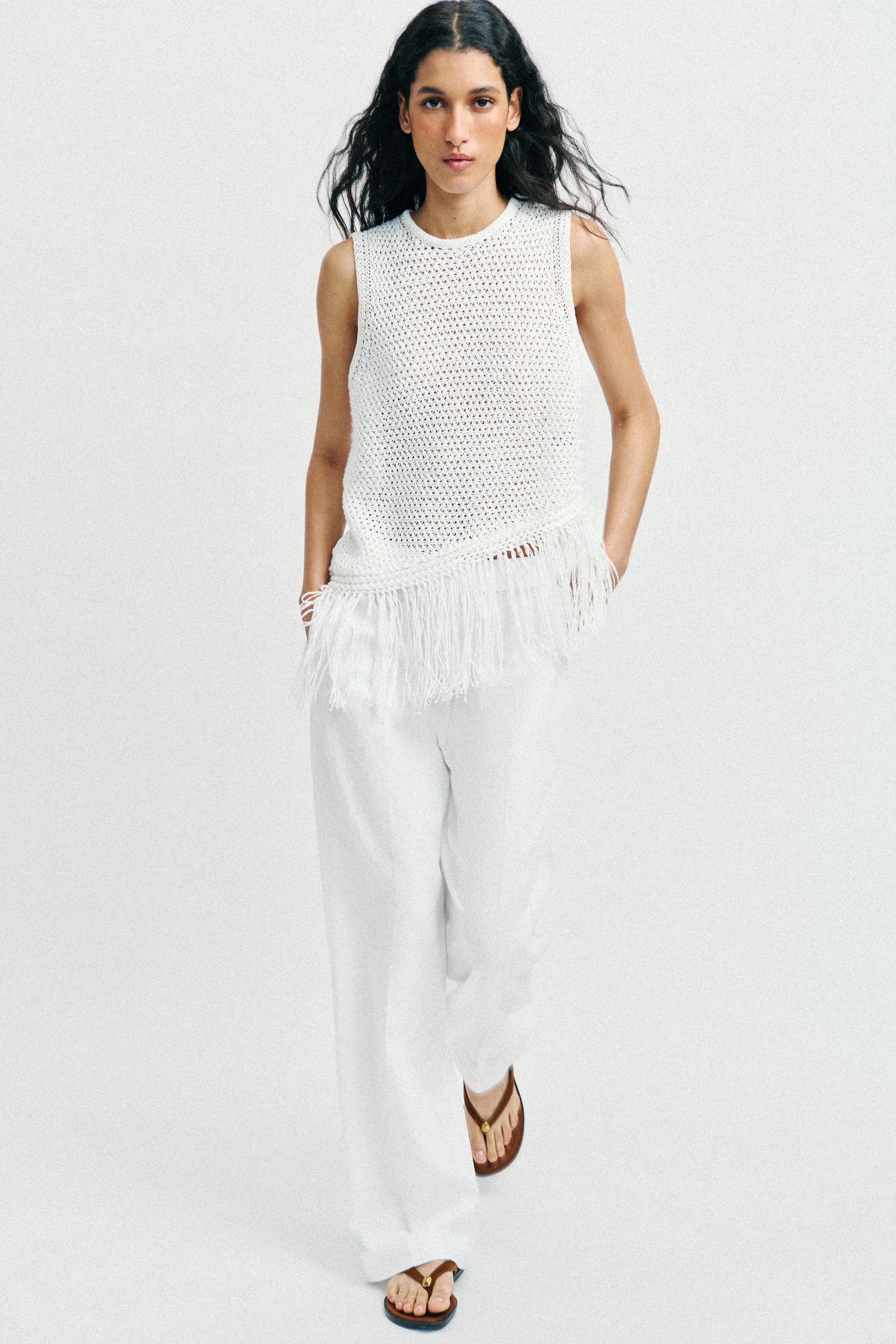 Top en maille à franges