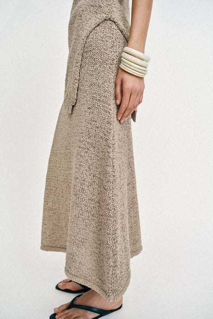 Top asymétrique en maille