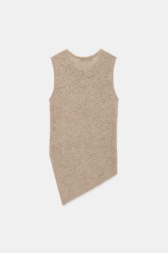 Top asymétrique en maille