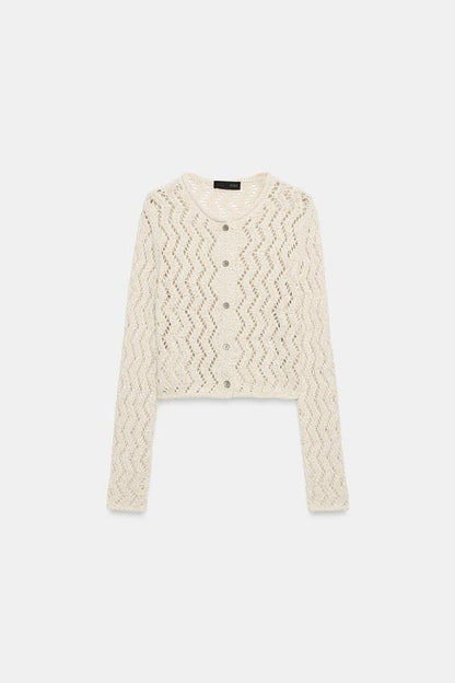 Veste en maille ajourée zigzag