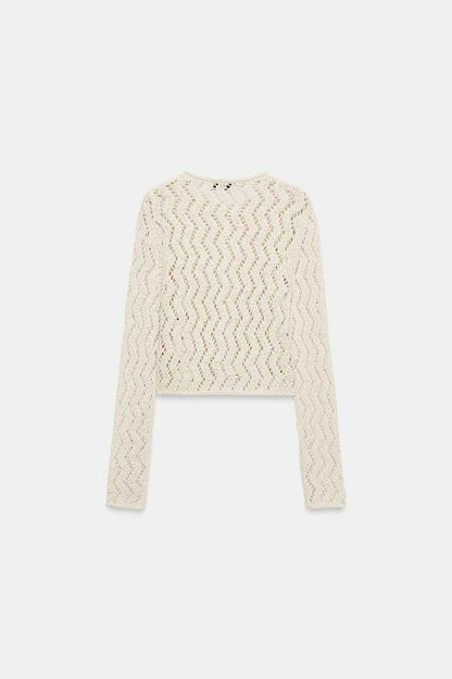 Veste en maille ajourée zigzag