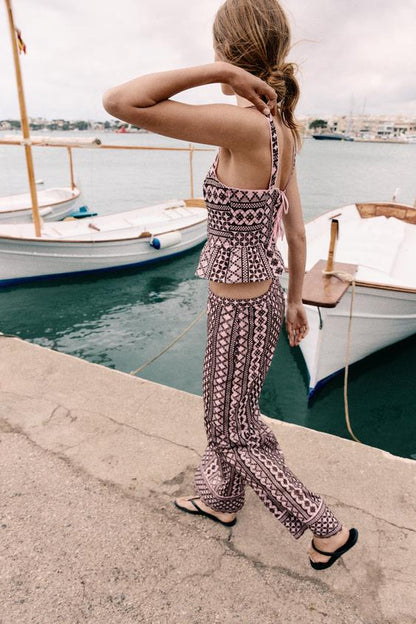 Pantalon large à broderies ajourées