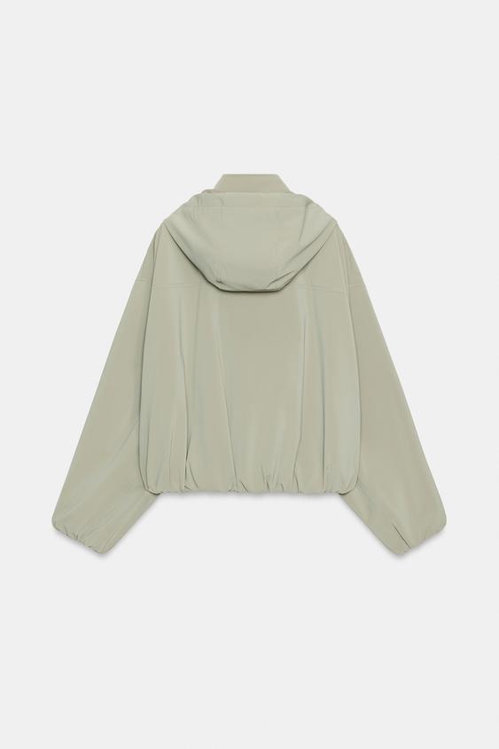 Blouson enduite à capuche