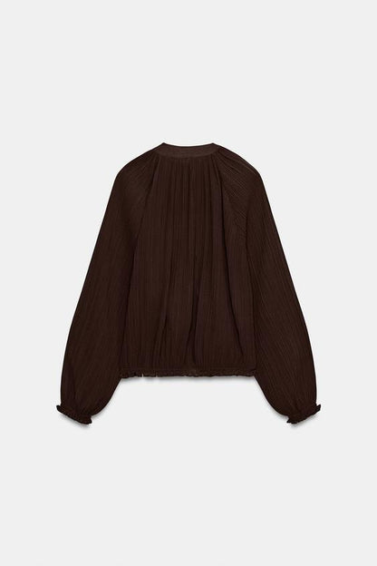 Veste en organza plissée