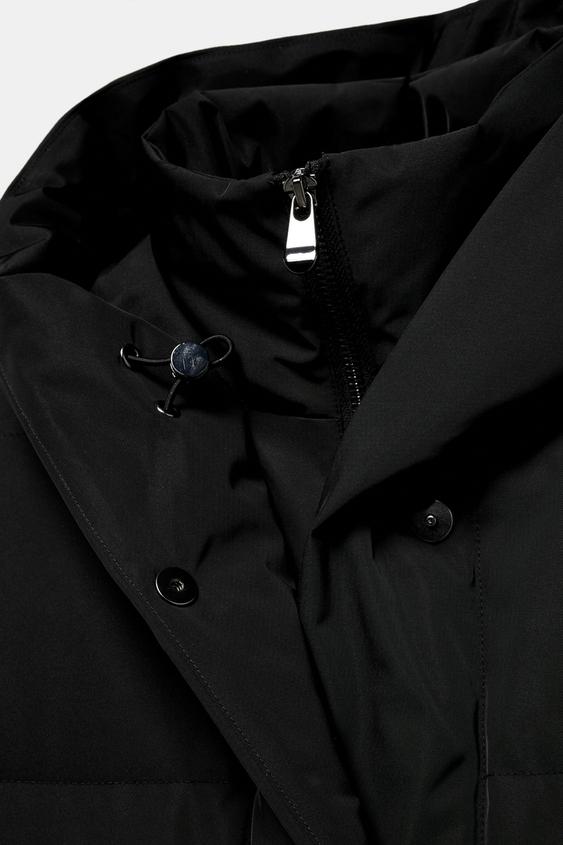 Anorak long matelassé 70 % duvet, 30 % plumes, à capuche, déperlant et coupe-vent