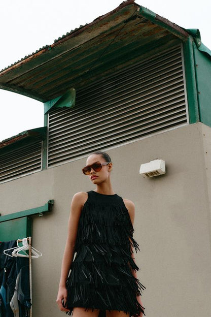 Robe à franges effet suédine à clous