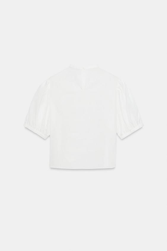 Chemise à brandebourgs à manches courtes bouffantes