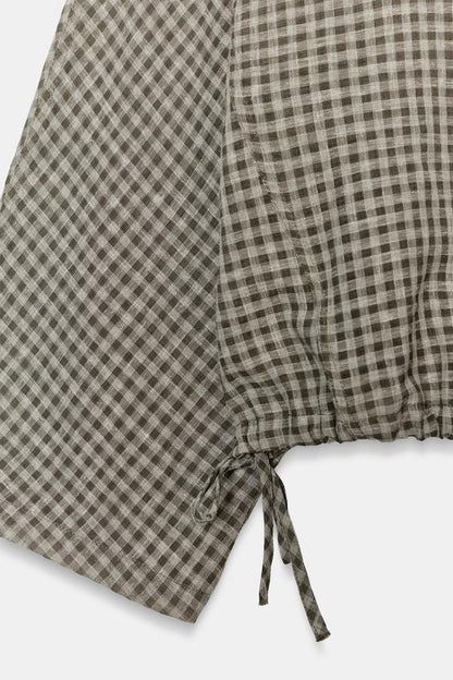 Chemise cape à carreaux