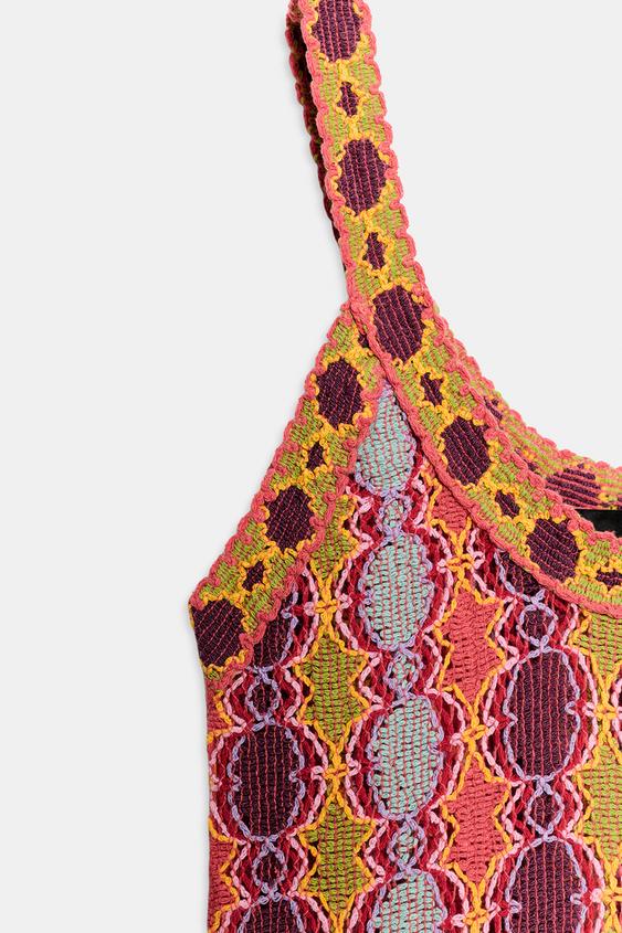 Robe longue en maille à franges