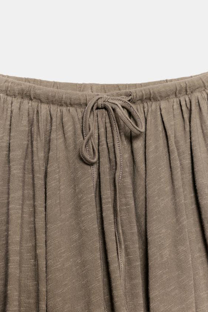 Jupe en tissu flammé à godets