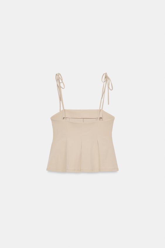 Top peplum à bretelles