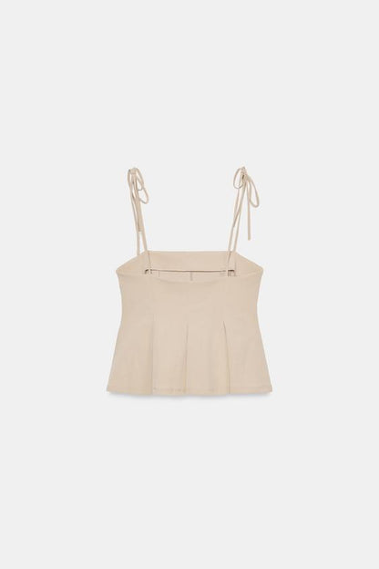 Top peplum à bretelles