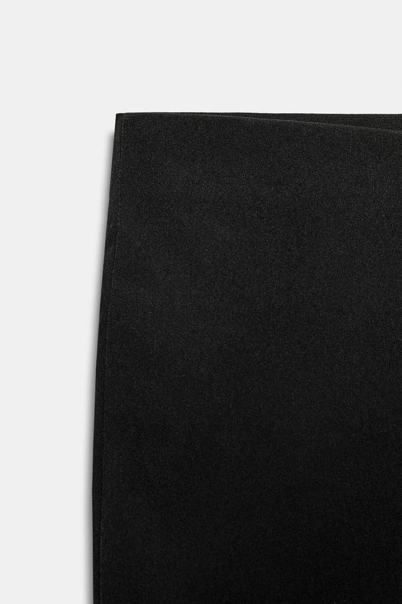Pantalon coupe évasée extensible à pois