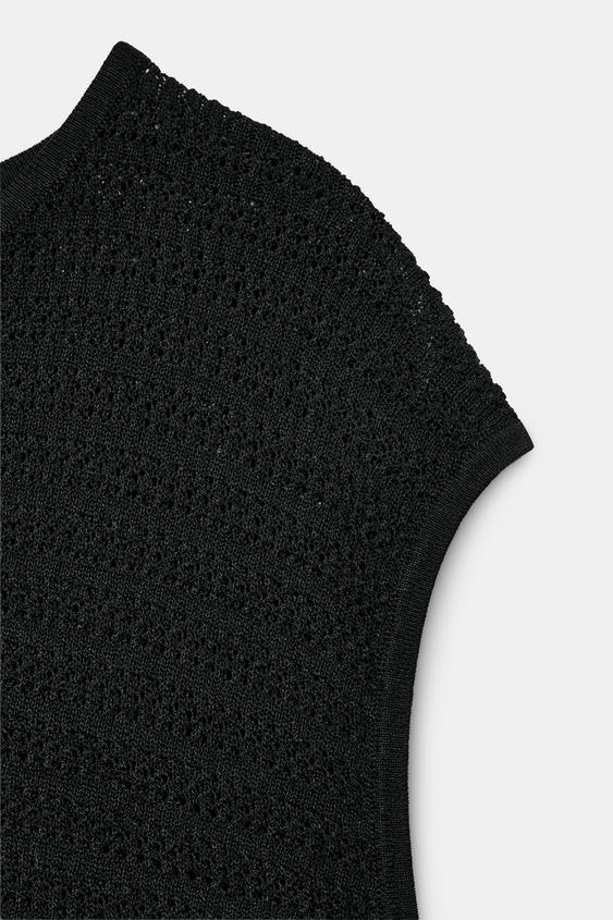 Top asymétrique en maille