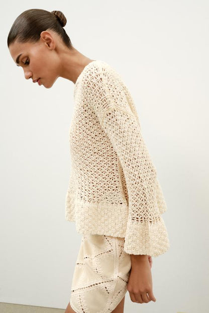 Pull en maille à volants
