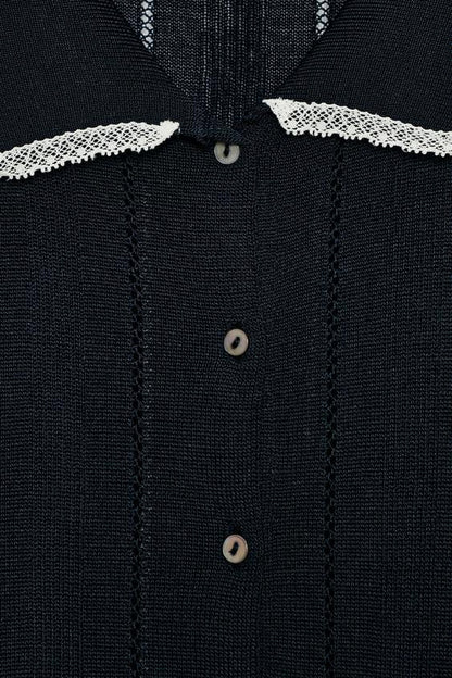 Veste polo en maille à dentelle et manches courtes