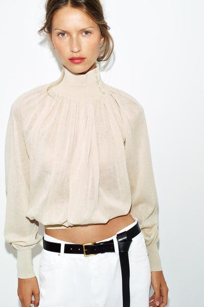 Blouse fluide en maille contrastée
