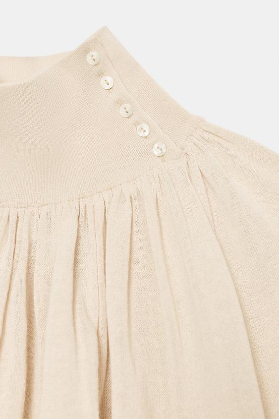 Blouse fluide en maille contrastée