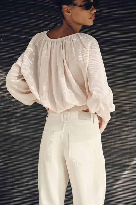Blouse en maille à col bateau