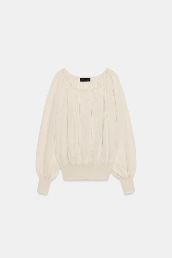 Blouse en maille à col bateau