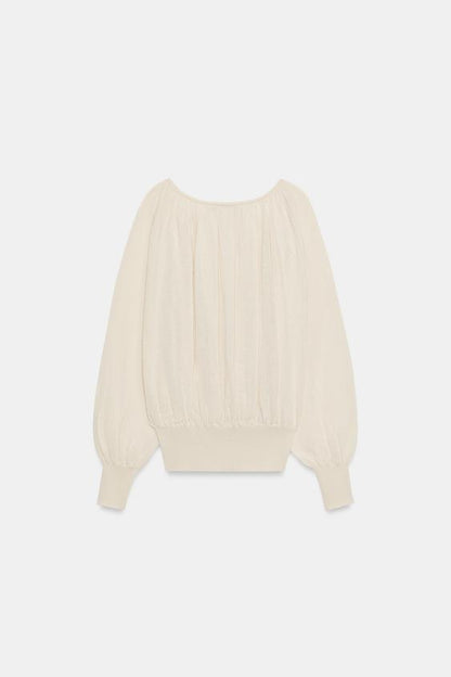 Blouse en maille à col bateau