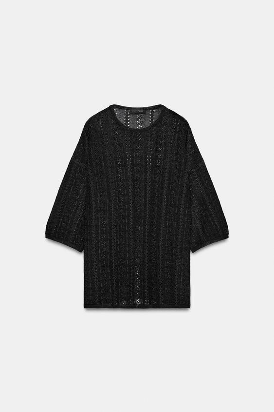 Pull en maille pointelle à fentes