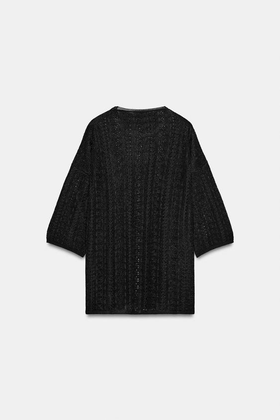 Pull en maille pointelle à fentes