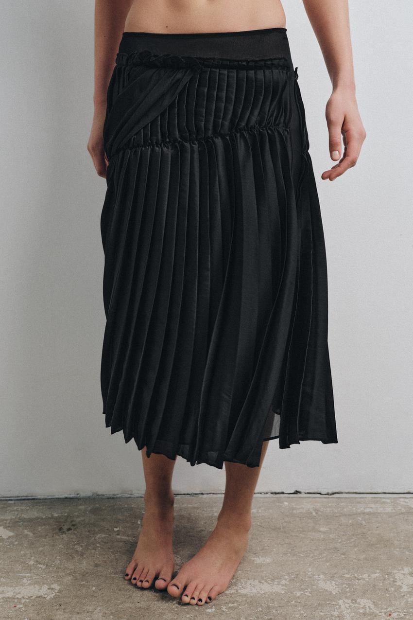 Jupe midi contrastée à plis