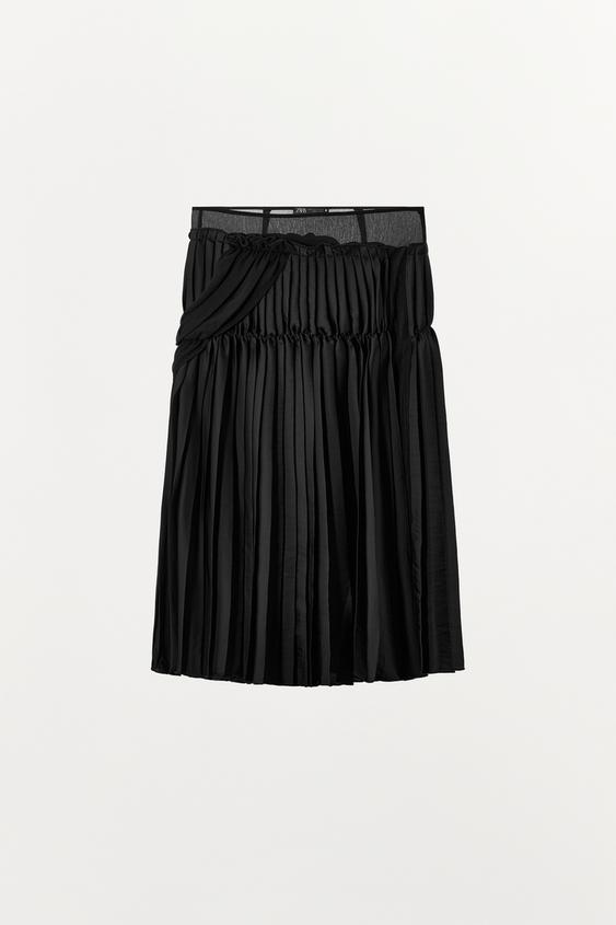 Jupe midi contrastée à plis