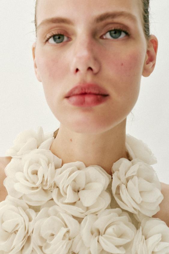 Top dos-nu en maille structurée à fleurs