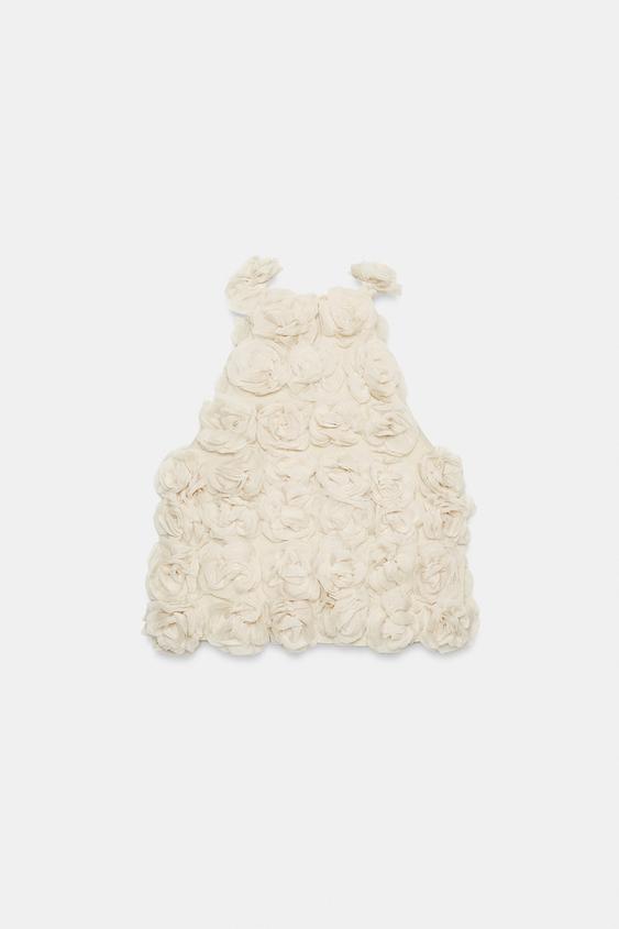 Top dos-nu en maille structurée à fleurs