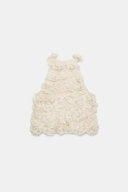 Top dos-nu en maille structurée à fleurs