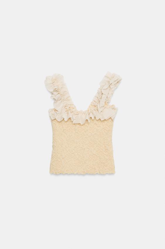 Top romantique en maille contrastée