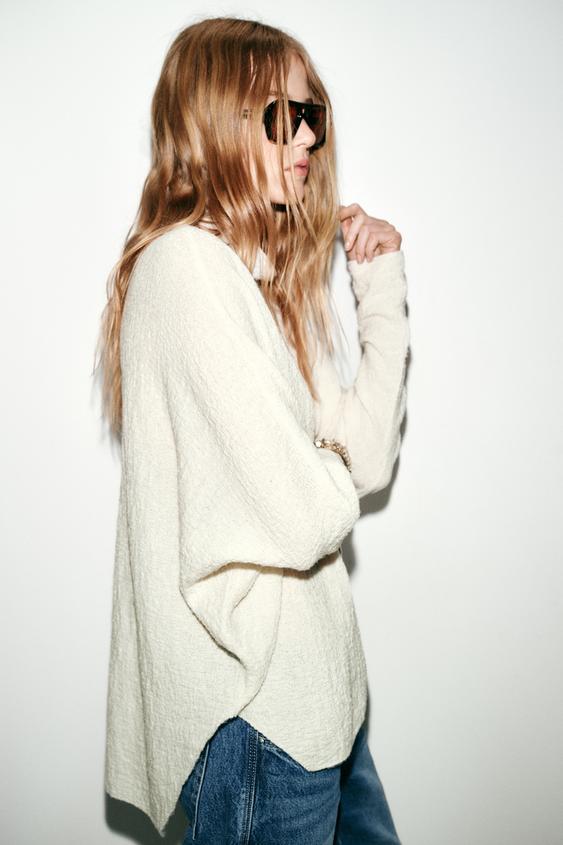 Pull effet cape en maille