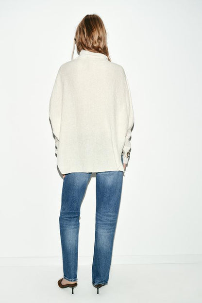 Pull effet cape en maille
