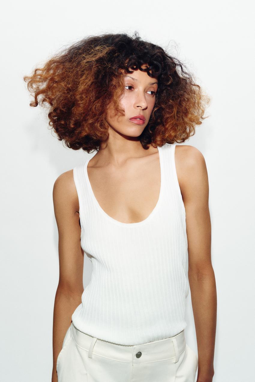 Top semi-transparent en maille contrastée