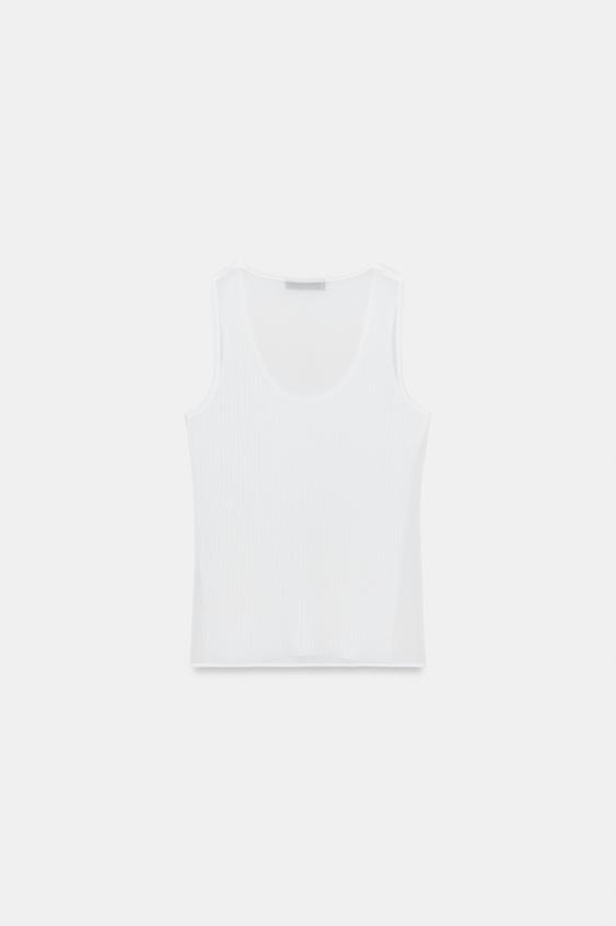Top semi-transparent en maille contrastée