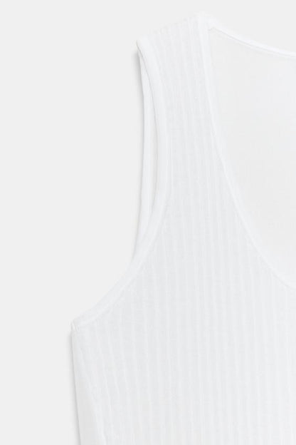 Top semi-transparent en maille contrastée