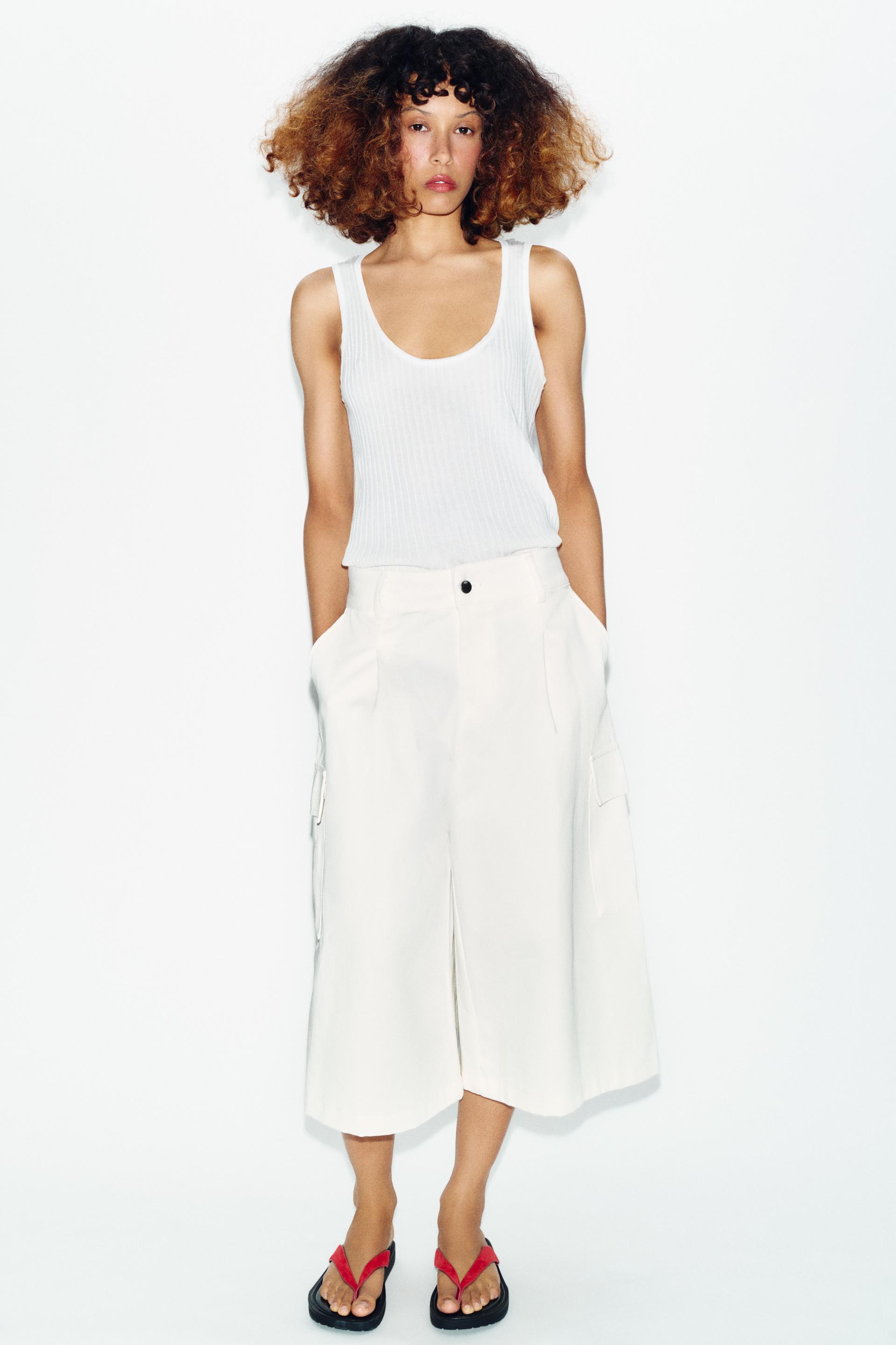 Top semi-transparent en maille contrastée