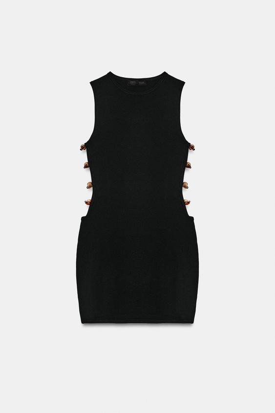 Robe courte en maille à fentes et perles