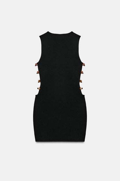 Robe courte en maille à fentes et perles