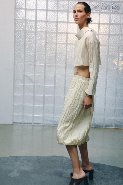 Jupe midi en maille effet froissé